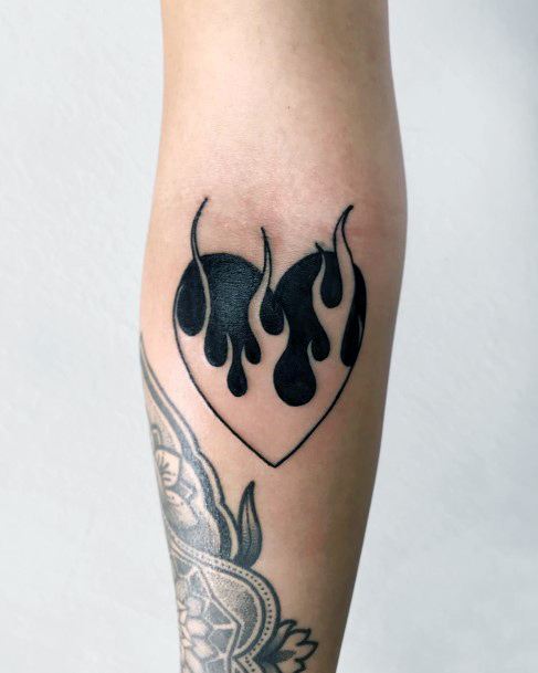 Incredible Flaming Heart Tattoo For Ladies