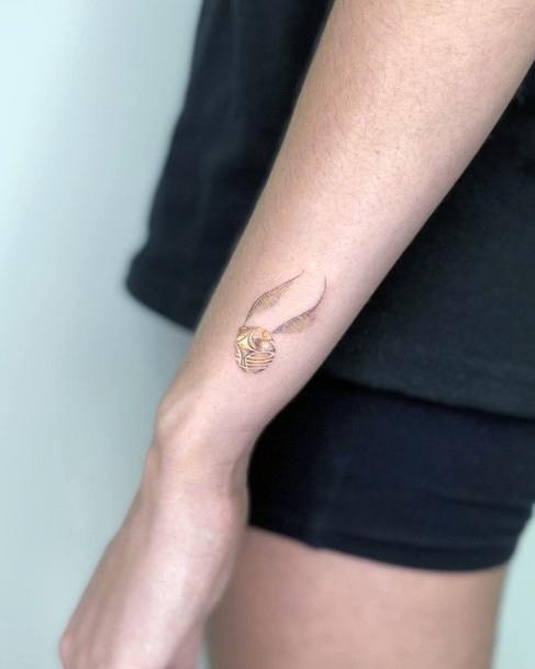 Incredible Golden Snitch Tattoo For Ladies