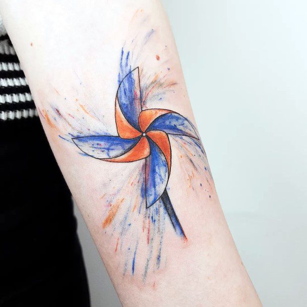 Incredible Pin Wheel Tattoo For Ladies