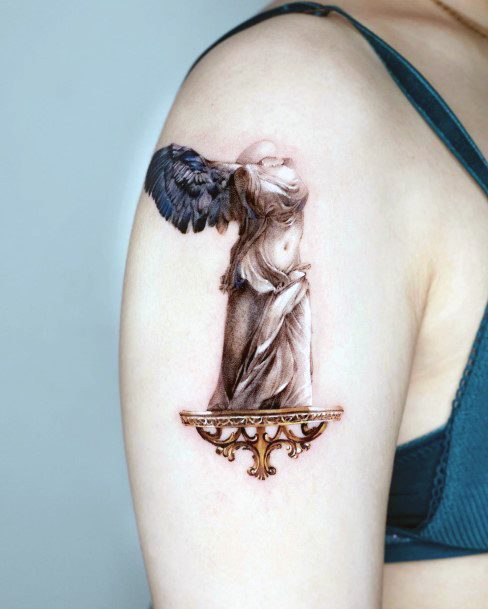 Incredible Statue Tattoo For Ladies