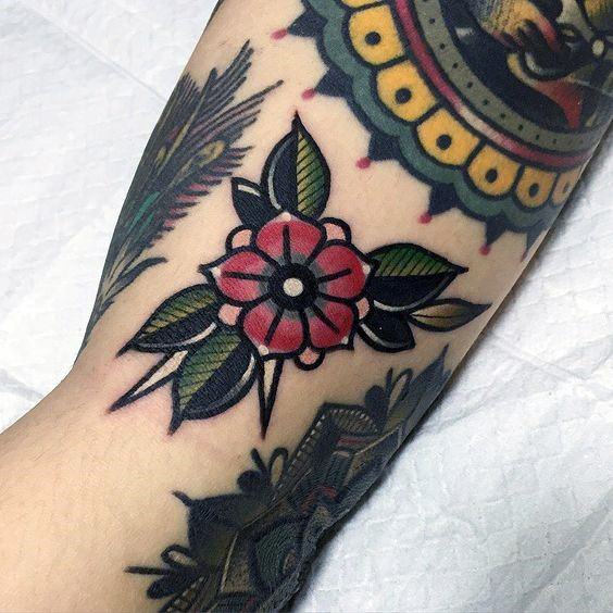 Inimitable Flower Traditional Tattoo For Women