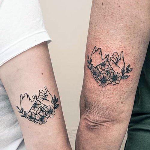 Interlinked Fingers Floral Tattoo Mother Daughter Arms