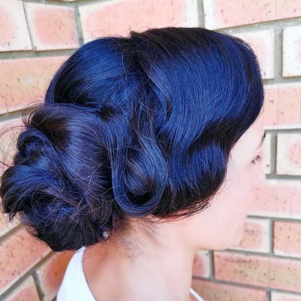 Intricate And Polished Sleek And Shiny Black Updo Womens Hairstyle