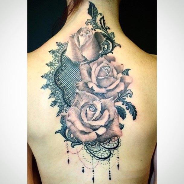 Intricate Art And Rose Tattoo Womens Back