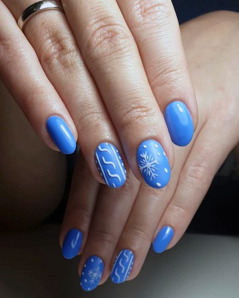 Intricate White Art On Blue Nails For Women