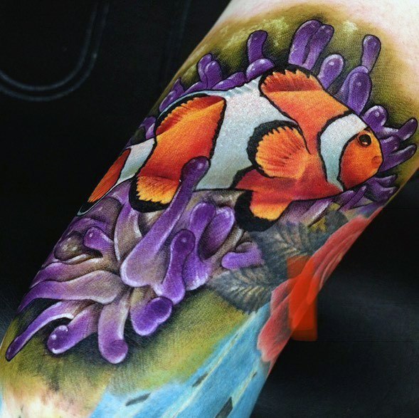 Ladies Clown Fish Tattoo Design Inspiration