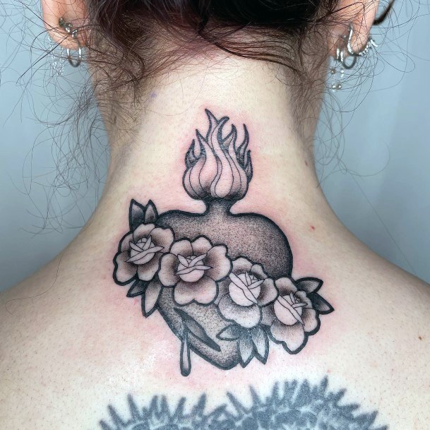 Ladies Flaming Heart Tattoo Design Inspiration