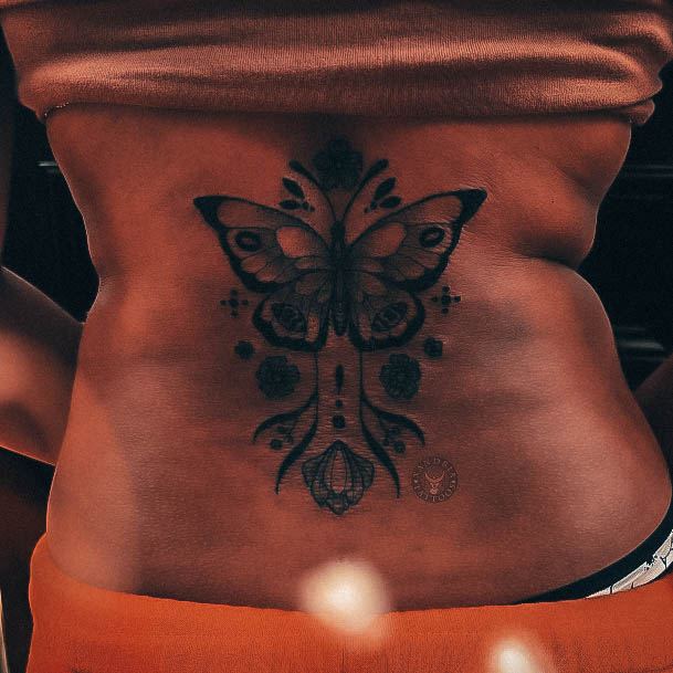 Ladies Lower Back Tattoo Design Inspiration