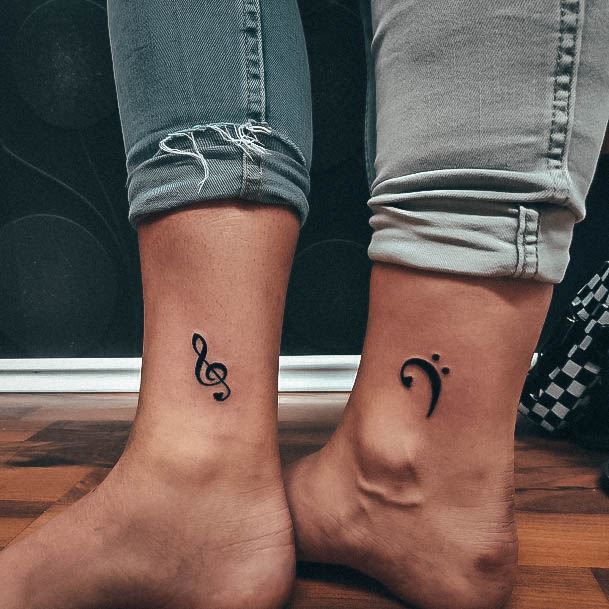 Ladies Music Note Tattoo Design Inspiration