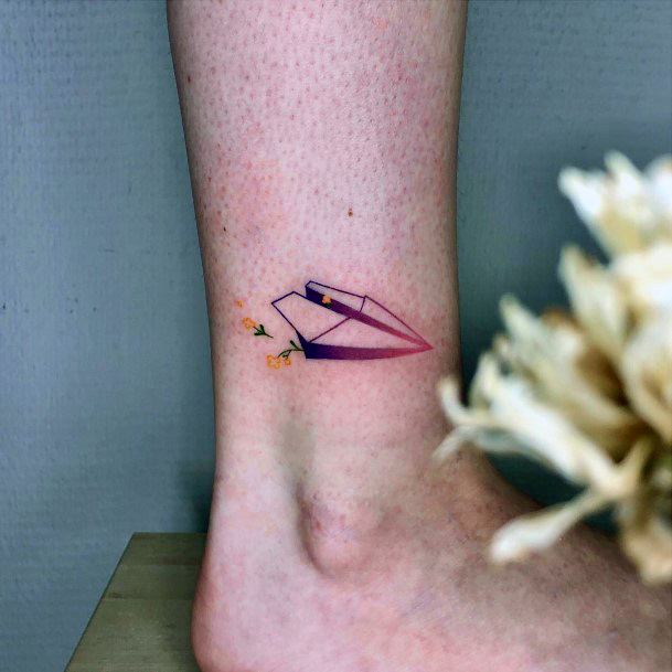 Ladies Paper Airplane Tattoo Design Inspiration