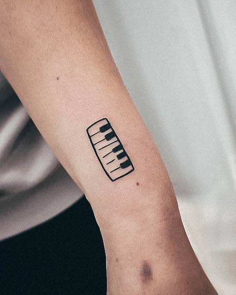 Ladies Piano Tattoo Design Inspiration