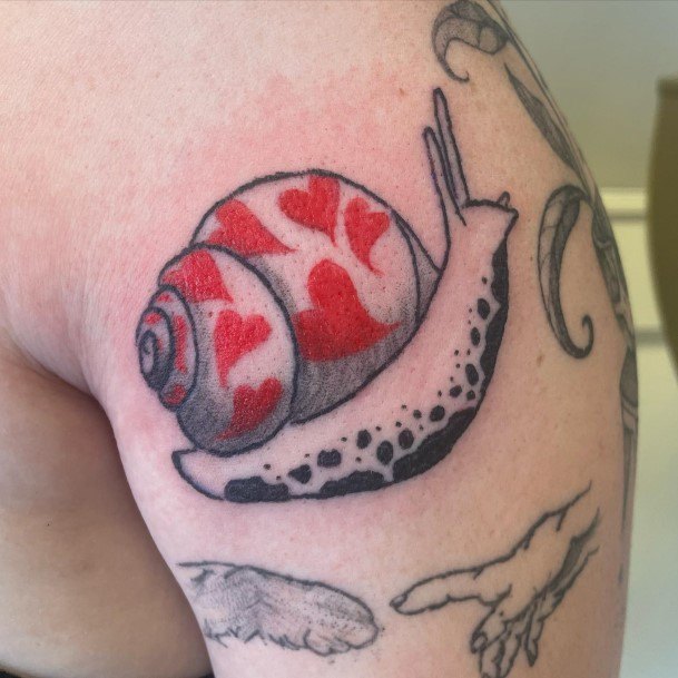 Ladies Snail Tattoo Design Inspiration