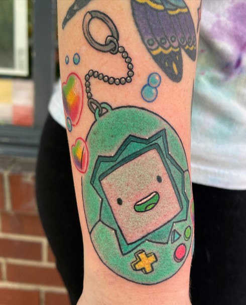 Ladies Tamagotchi Tattoo Design Inspiration