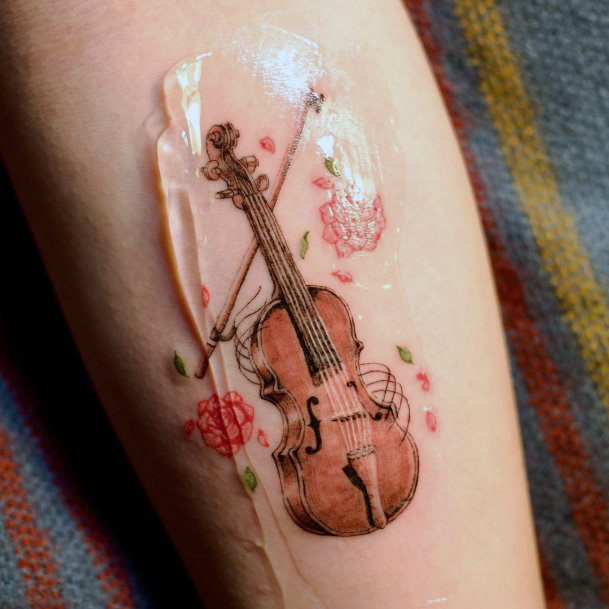 Ladies Violin Tattoo Design Inspiration