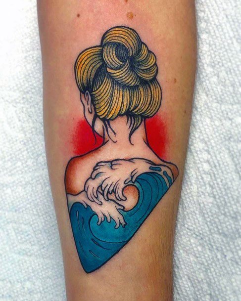 Lady With Coiled Hair And Wave Tattoo Womens Hand