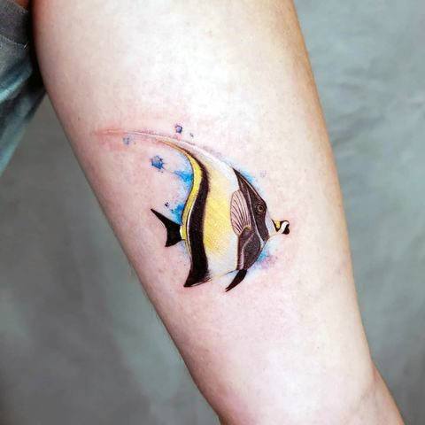 Lady With Elegant Angel Fish Tattoo Body Art