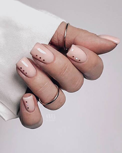 Lady With Elegant Beige Nail Body Art