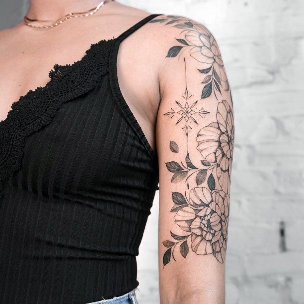 Lady With Elegant Bicep Tattoo Body Art