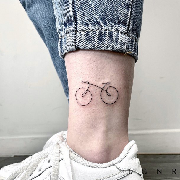 Lady With Elegant Bicycle Tattoo Body Art