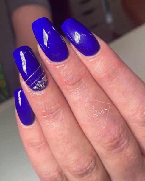 Lady With Elegant Blue And Silver Nail Body Art