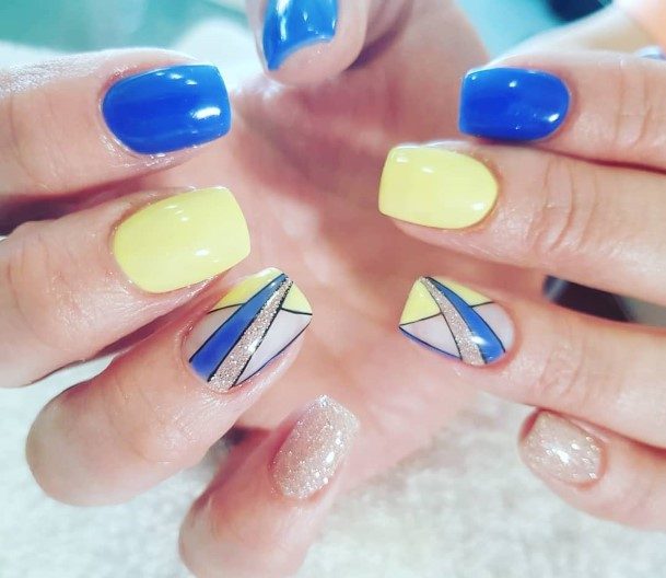 Lady With Elegant Blue And Yellow Nail Body Art