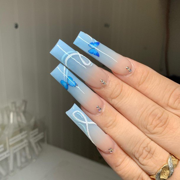 Lady With Elegant Blue Ombre Nail Body Art