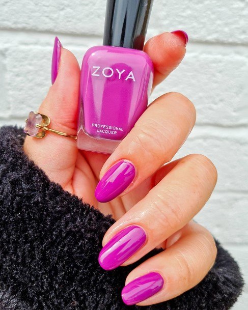 Lady With Elegant Bright Purple Nail Body Art