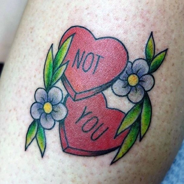 Lady With Elegant Candy Heart Tattoo Body Art