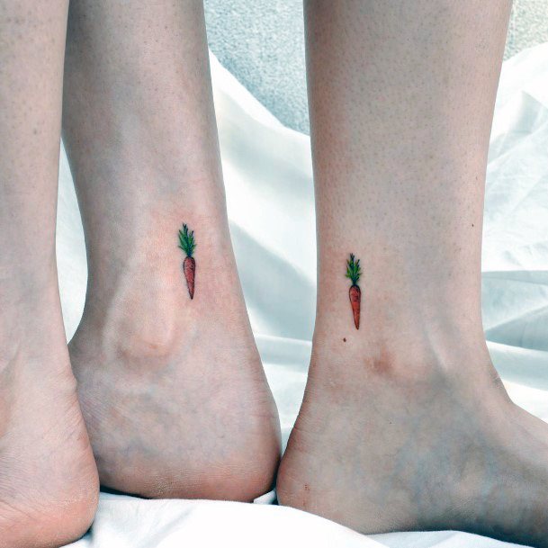 Lady With Elegant Carrot Tattoo Body Art