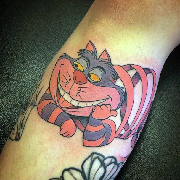 Lady With Elegant Cheshire Cat Tattoo Body Art