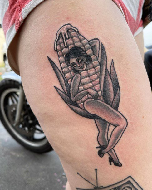 Lady With Elegant Corn Tattoo Body Art