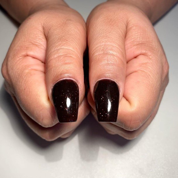 Lady With Elegant Dark Brown Nail Body Art