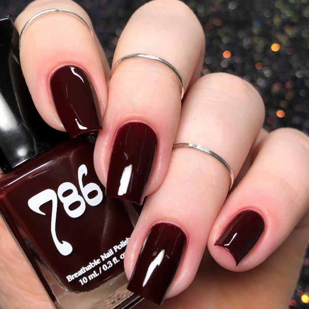Lady With Elegant Deep Red Nail Body Art