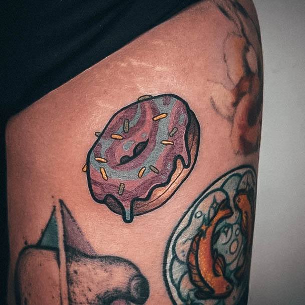 Lady With Elegant Donut Tattoo Body Art