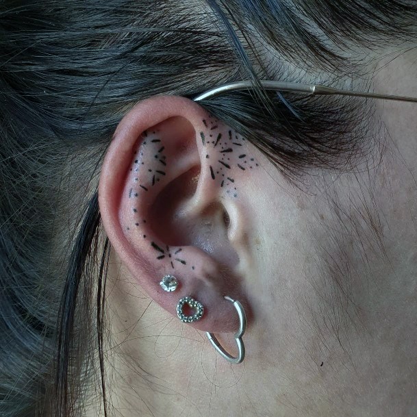 Lady With Elegant Ear Tattoo Body Art