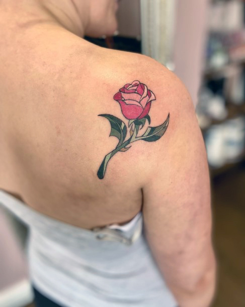 Lady With Elegant Enchanted Rose Tattoo Body Art