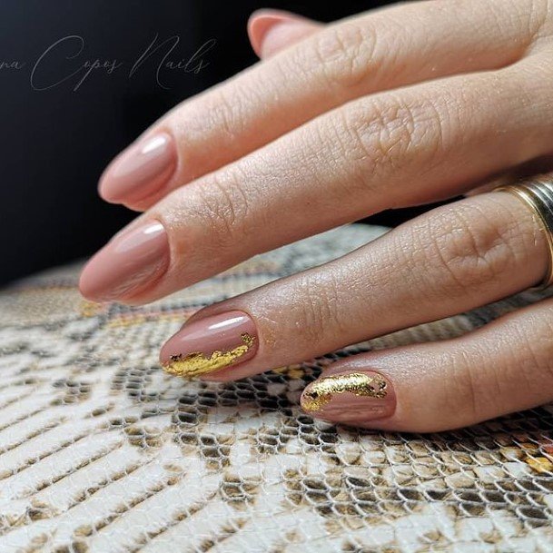 Lady With Elegant Gold Nail Body Art