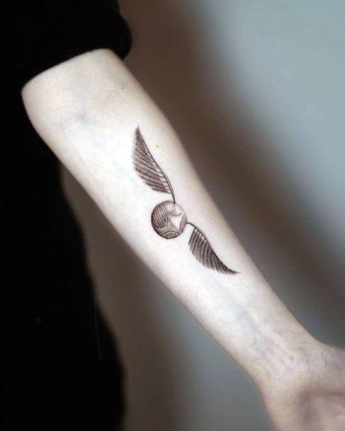 Lady With Elegant Golden Snitch Tattoo Body Art