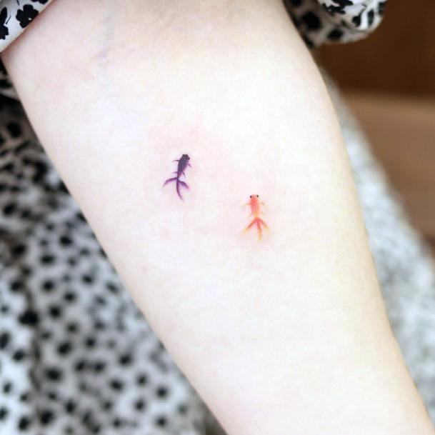 Lady With Elegant Goldfish Tattoo Body Art