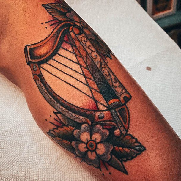 Lady With Elegant Harp Tattoo Body Art