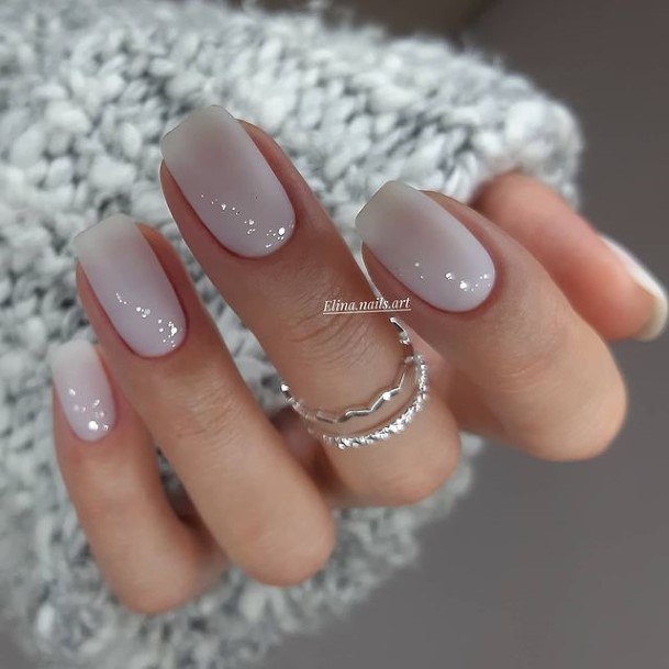 Lady With Elegant Ivory Nail Body Art