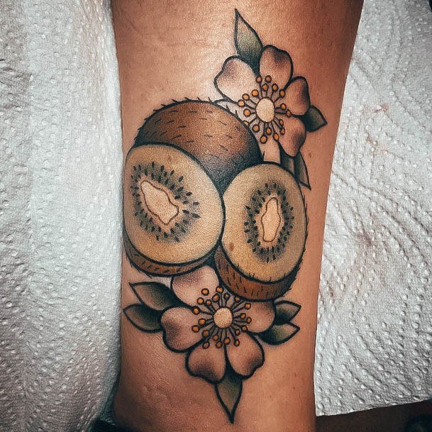 Lady With Elegant Kiwi Tattoo Body Art