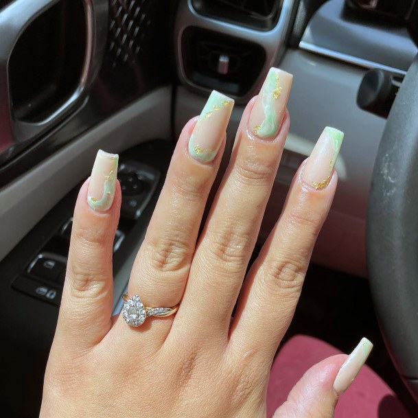 Lady With Elegant Light Green Nail Body Art