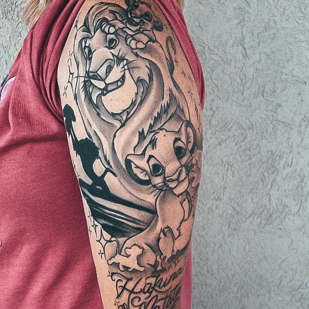 Lady With Elegant Lion King Tattoo Body Art