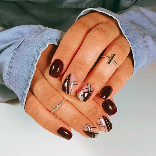 Lady With Elegant Maroon And Black Nail Body Art