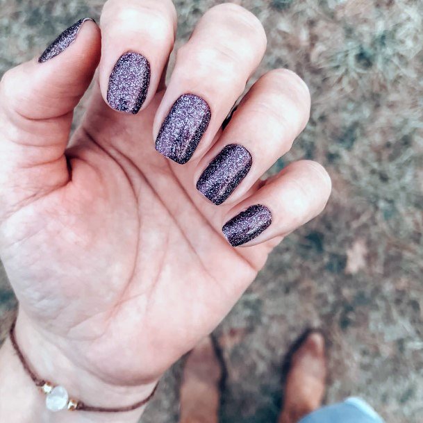 Lady With Elegant Maroon Glitter Nail Body Art