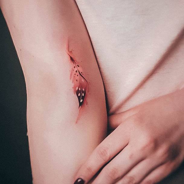 Lady With Elegant Miniature Tattoo Body Art