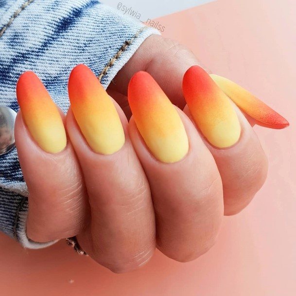 Lady With Elegant Orange And White Nail Body Art