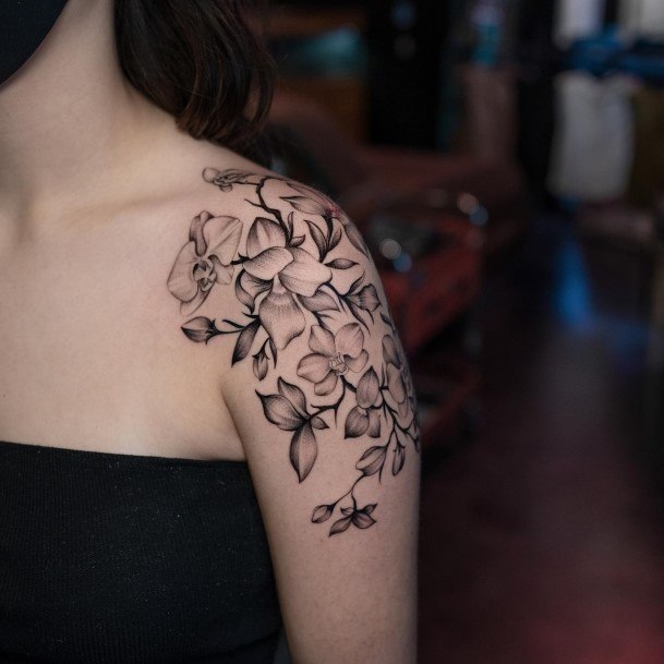 Lady With Elegant Orchid Tattoo Body Art