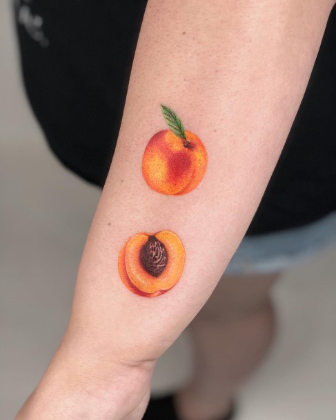 Lady With Elegant Peach Tattoo Body Art